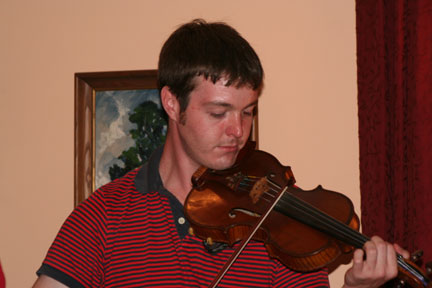 Andrew fiddling